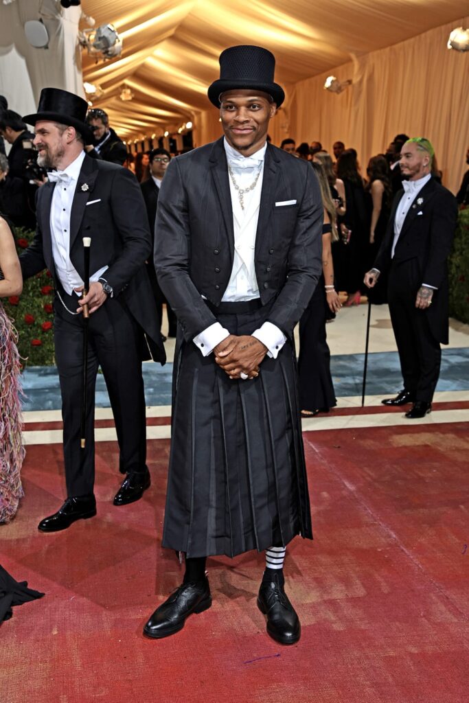 NBA star Russell Westbrook wore a Thom Browne kilt and matching black top hat. Credit: Dimitrios Kambouris/Getty Imagesfor The Met Museum/Vogue